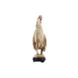 AN EARLY 20TH CENTURY CHINESE CARVED IVORY FIGURE ON HORSEBACK