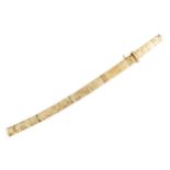 AN EARLY 20TH CENTURY JAPANESE IVORY CASED SWORD