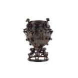 AN EARLY 20TH CENTURY AFRICAN BALUSTER SHAPED VESSEL