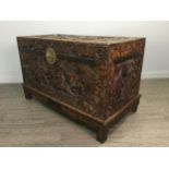 AN EARLY 20TH CENTURY CHINESE CAMPHORWOOD CHEST ON STAND