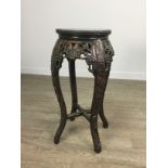 A CHINESE CARVED WOOD PLANT TABLE