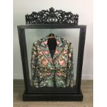 A CHINESE MAHJONG JACKET IN AN EBONISED DISPLAY CASE