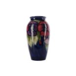 A MOORCROFT 'PANSY' PATTERN VASE