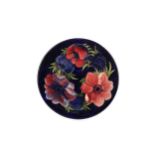 A MOORCROFT 'CLEMATIS' PATTERN PLATE
