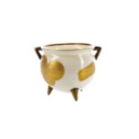 A ROYAL WORCESTER TWIN HANDLED CAULDRON VASE