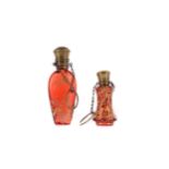 A LATE 19TH CENTURY CRANBERRY GLASS SCENT BOTTLE AND ANOTHER