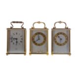 A MID 20TH CENTURY CARRIAGE CLOCK AND TWO OTHERS