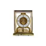 A JAEGAR LE COULTRE ATMOS CLOCK, WITH WALL BRACKET