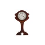 AN ART NOUVEAU MANTEL CLOCK