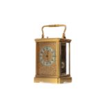 A 19TH CENTURY BRASS CASED REPEATING CARRIAGE CLOCK BY GUY, LAMAILLE & CO