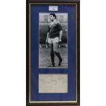 A FRAMED PHOTOGRAPH AND AUTOGRAPH OF JIM BAXTER