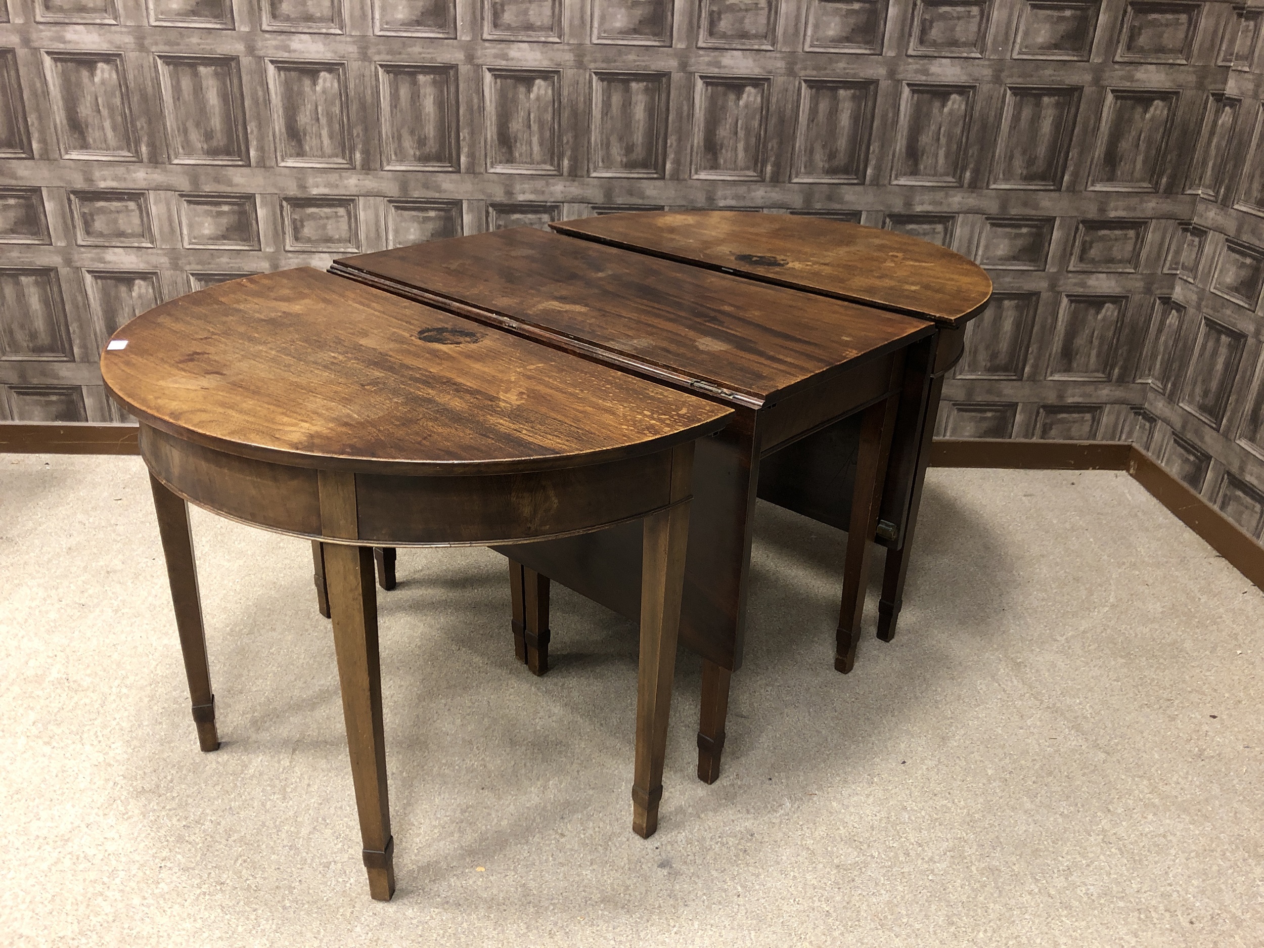 A MAHOGANY SECTIONAL DINING TABLE