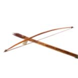 A 20TH CENTURY DANI TRIBAL BOW AND ARROWS