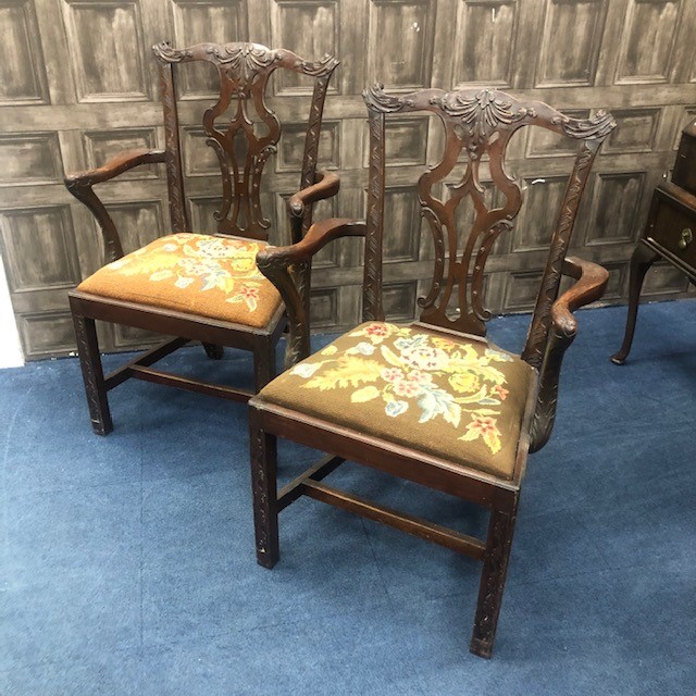 A SET OF FOUR MAHOGANY OPEN ELBOW CHAIRS