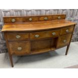 A REGENCY MAHOGANY BOW FRONTED SIDEBOARD