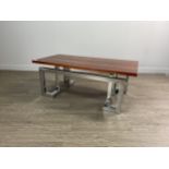 A MODERNIST ROSEWOOD AND CHROME COFFEE TABLE