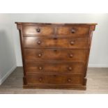 A VICTORIAN OAK CHEST OF DRAWERS