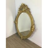 A LATE 19TH CENTURY GILT WOOD WALL MIRROR