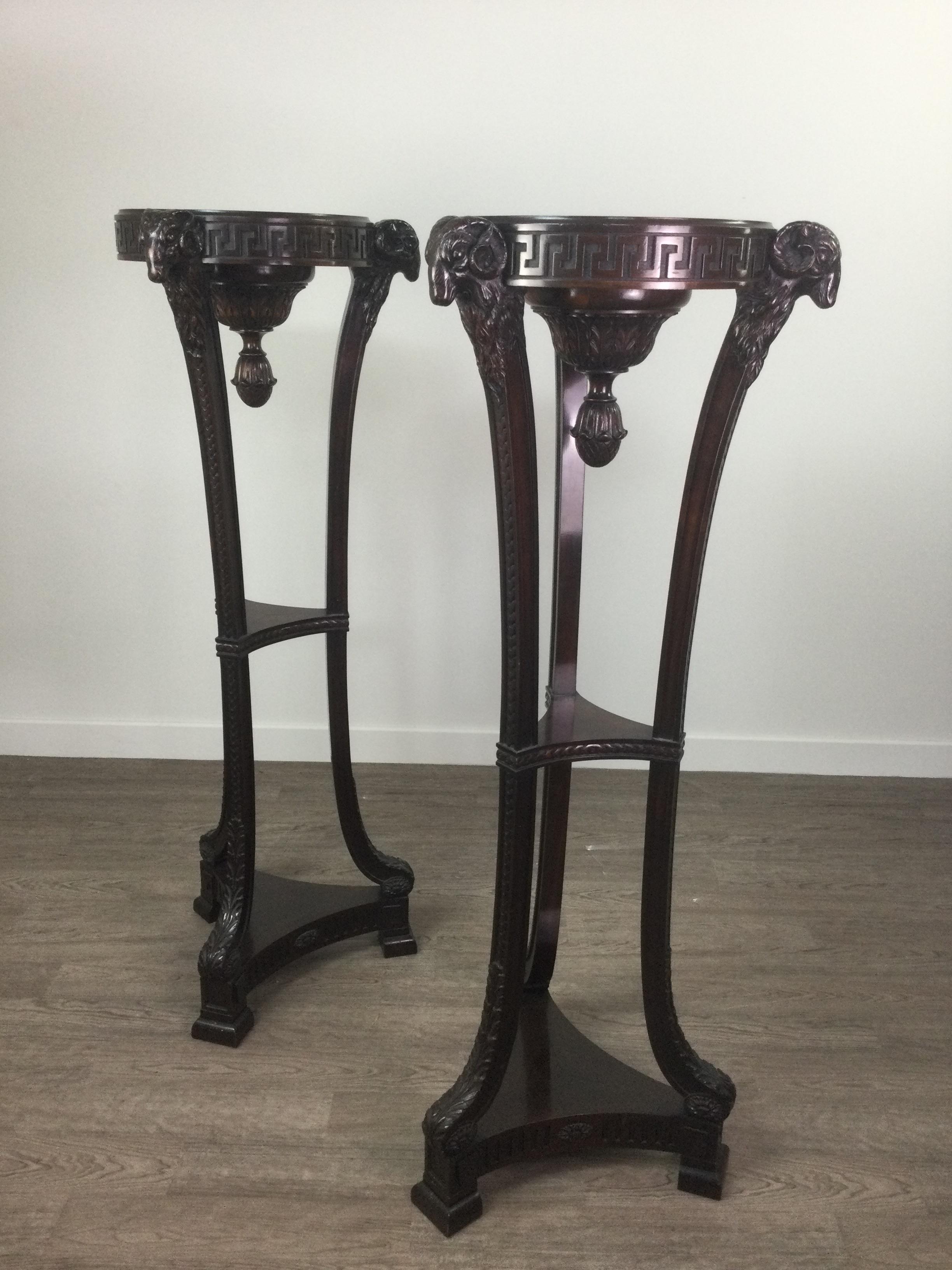 A PAIR OF MAHOGANY TORCHERES OF ADAM DESIGN