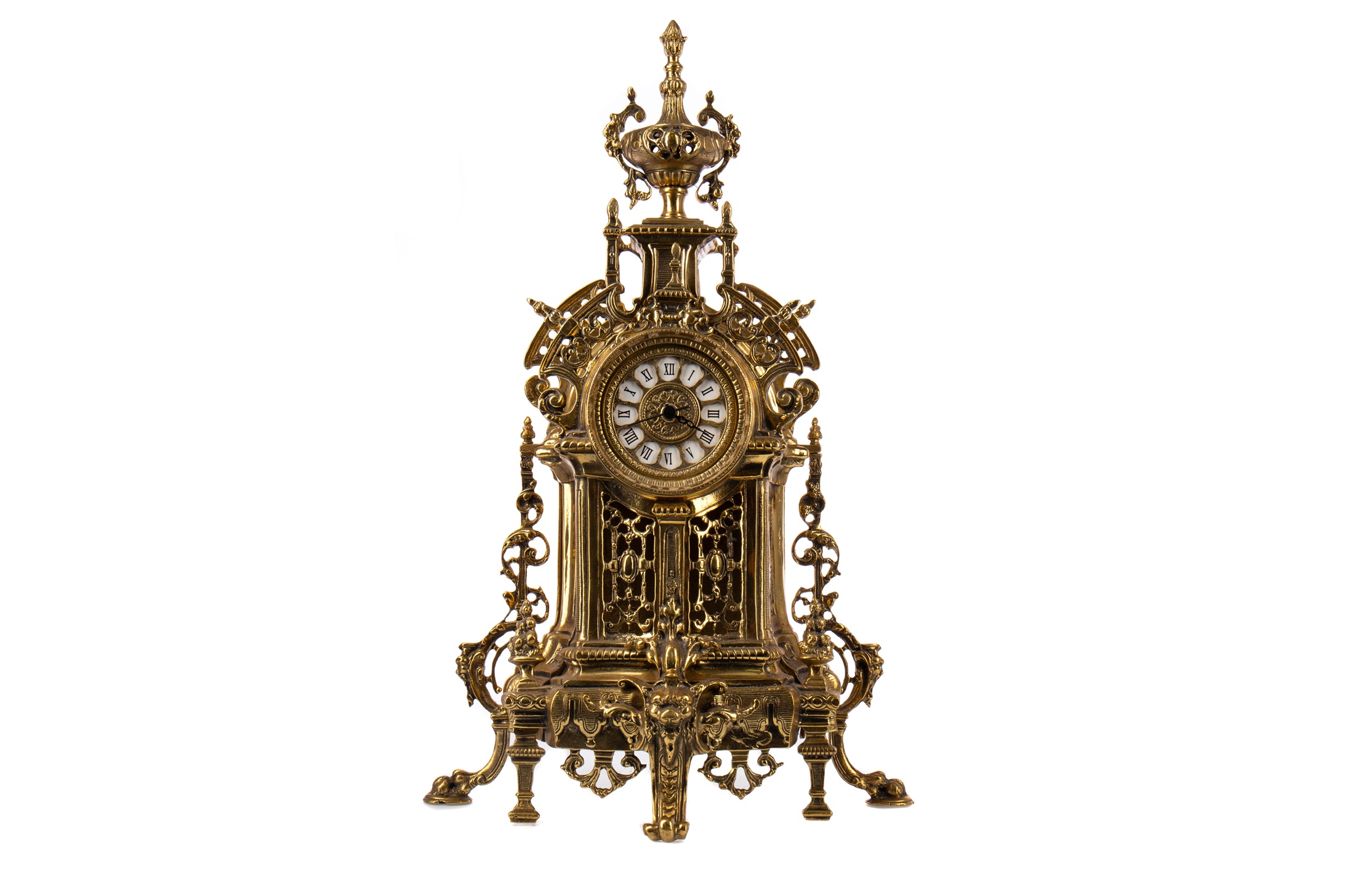 A BRASS MANTEL TIMEPIECE