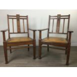 A PAIR OF ARTS & CRAFTS OAK ARMCHAIRS