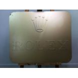 A ROLEX GILT METAL ADVERTISEMENT SIGN