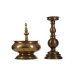 A DUTCH TOBACCO JAR AND A CANDLESTICK