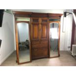 A LATE VICTORIAN MAHOGANY DOUBLE WARDROBE