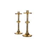 A PAIR OF 19TH CENTURY BRASS ALTAR CANDLESTICKS