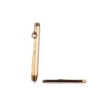A NINE CARAT GOLD PROPELLING PENCIL AND BAR BROOCH