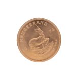 A GOLD KRUGERRAND DATED 1974