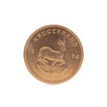 A GOLD KRUGERRAND DATED 1974