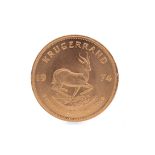 A GOLD KRUGERRAND DATED 1974