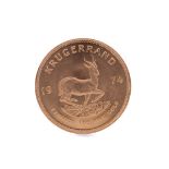 A GOLD KRUGERRAND DATED 1974