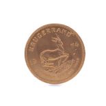 A GOLD KRUGERRAND DATED 1974