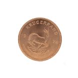 A GOLD KRUGERRAND DATED 1974