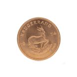 A GOLD KRUGERRAND DATED 1974