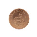 A GOLD KRUGERRAND DATED 1974