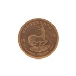 A GOLD KRUGERRAND DATED 1974