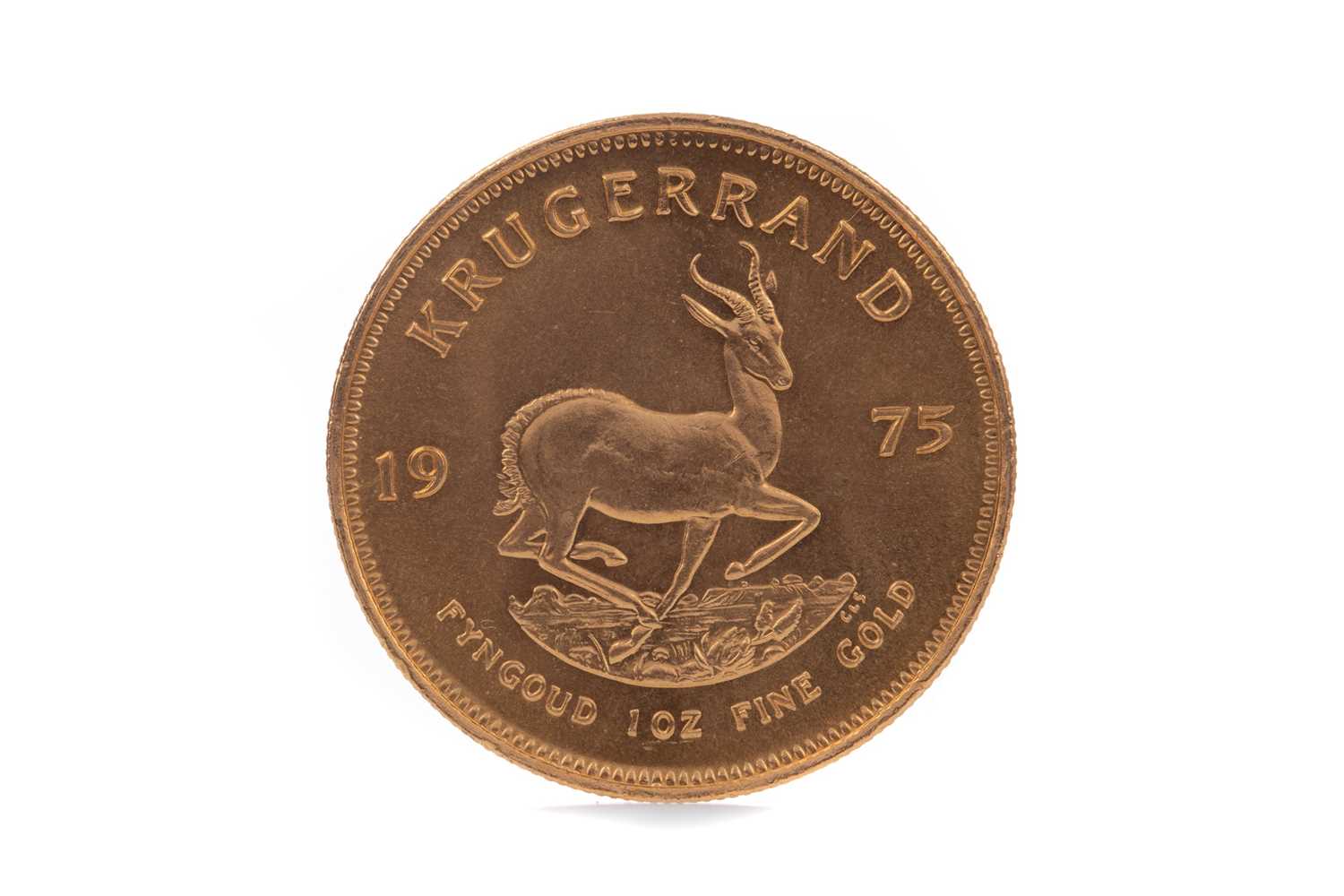 A GOLD KRUGERRAND DATED 1975