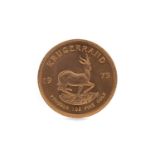 A GOLD KRUGERRAND DATED 1975