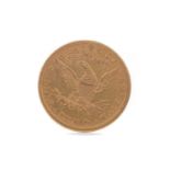 A GOLD AMERICAN TEN DOLLAR COIN