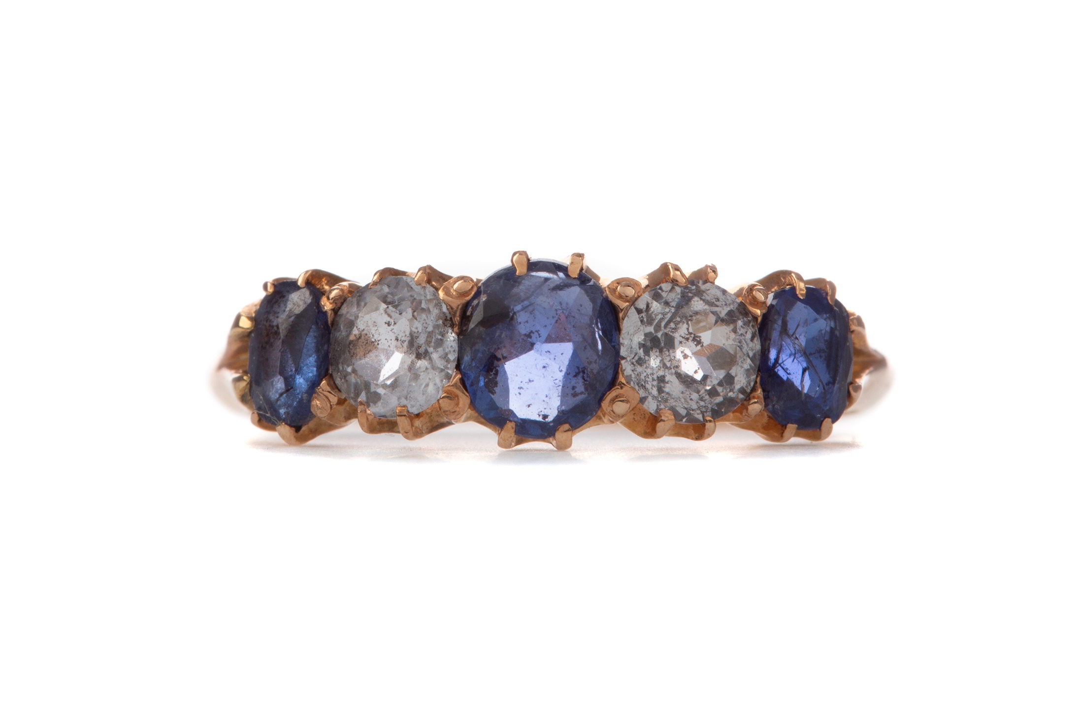 A BLUE GEM SET AND DIAMOND FIVE STONE RING