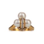 A PEARL AND WHITE GEM SET RING