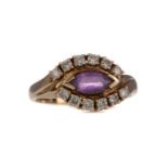 AN AMETHYST AND WHITE GEM SET RING
