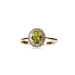 A PERIDOT AND DIAMOND RING