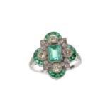 AN EMERALD AND DIAMOND RING