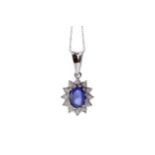 A SAPPHIRE AND DIAMOND PENDANT