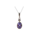 A TANZANITE AND DIAMOND PENDANT