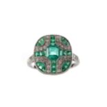 AN EMERALD AND DIAMOND RING